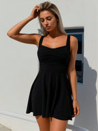 Black A-line sleeveless dress, square neckline, ruched bodice, flared hem