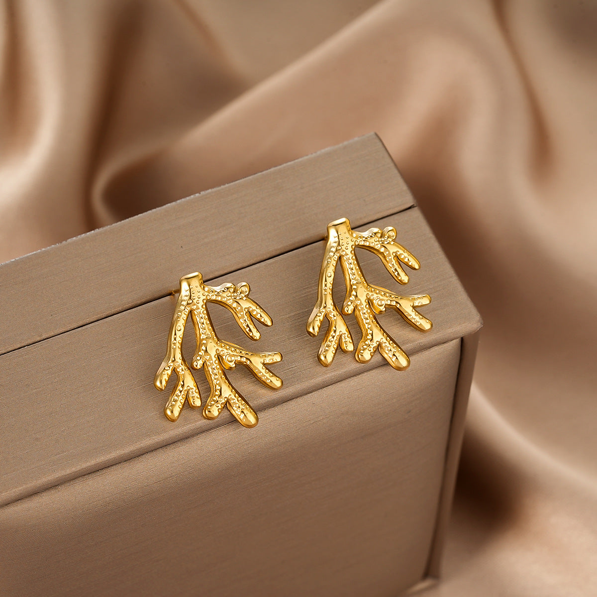 18K gold-color rotating leaf stud earrings