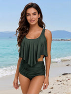Green one-piece swimsuit with layered ruffle front and cutout waist detail