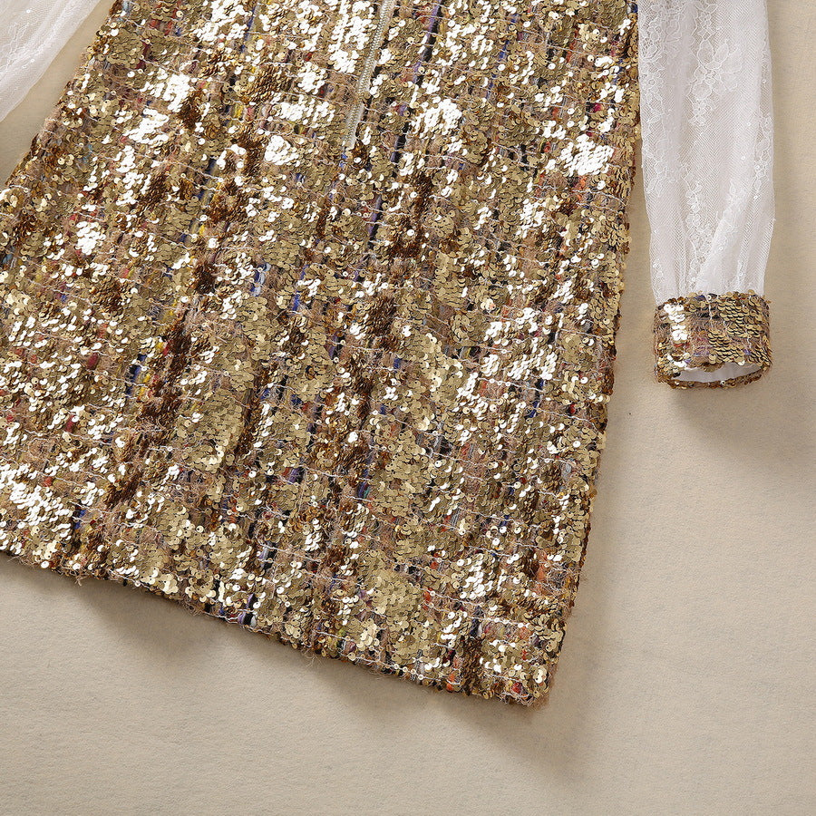 Gold sequin dress hem and sheer lace sleeve cuff with textured, sparkling trim