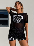 Black sheer swim cover-up with coconut palm graphic and matching palm shorts