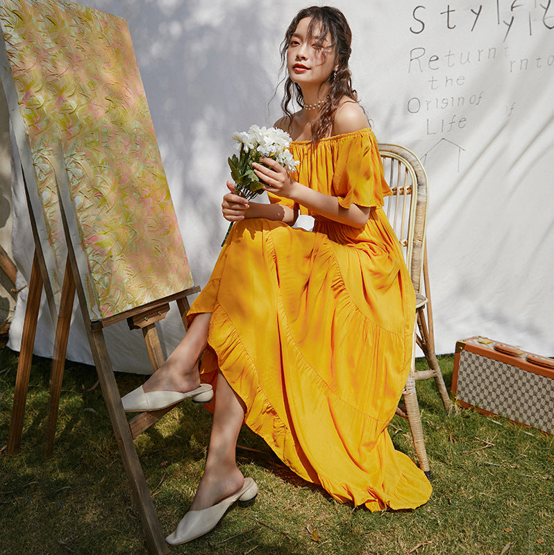 Yellow boho off-shoulder tiered dress with layered skirt and gathered waist