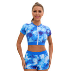 Women's blue tie-dye crop-top swimwear set with shorts
