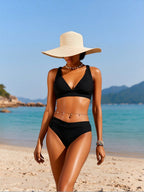 Black ruched triangle bikini top with high-cut bikini bottoms