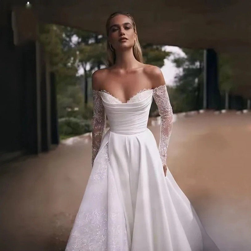 Women's white off-shoulder long-sleeve wedding dress