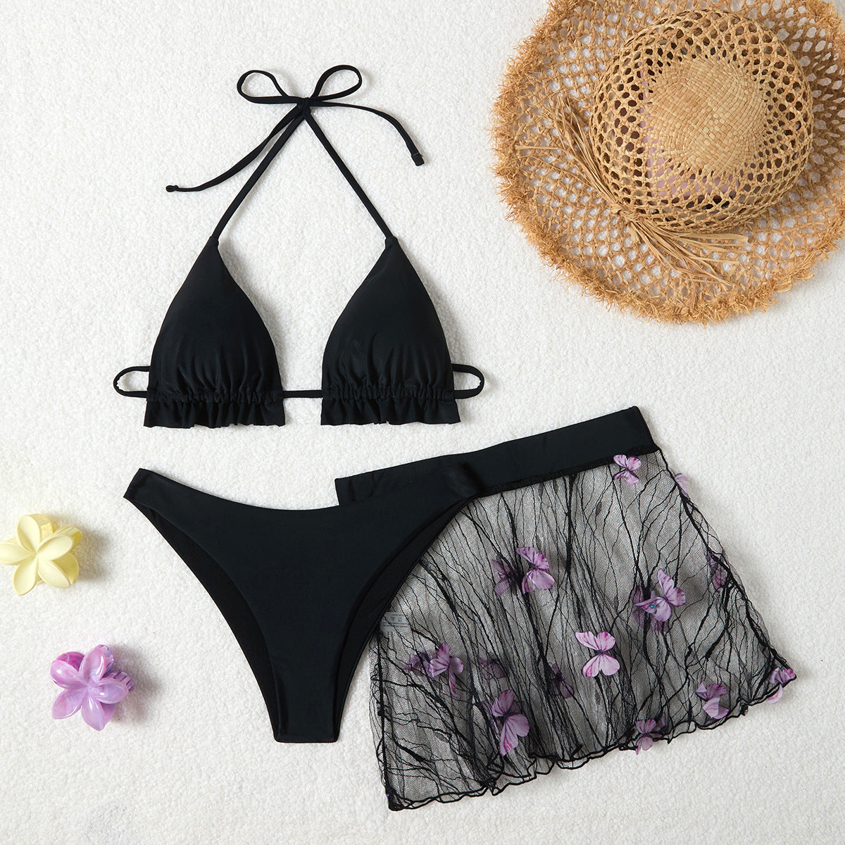 Women's black bikini set with floral mesh mini skirt