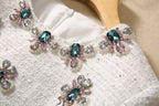Beige sequin neckline with teal and pink crystal floral clusters