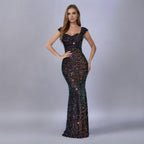 Black sequin sling dress with sweetheart neckline and fitted mermaid silhouette